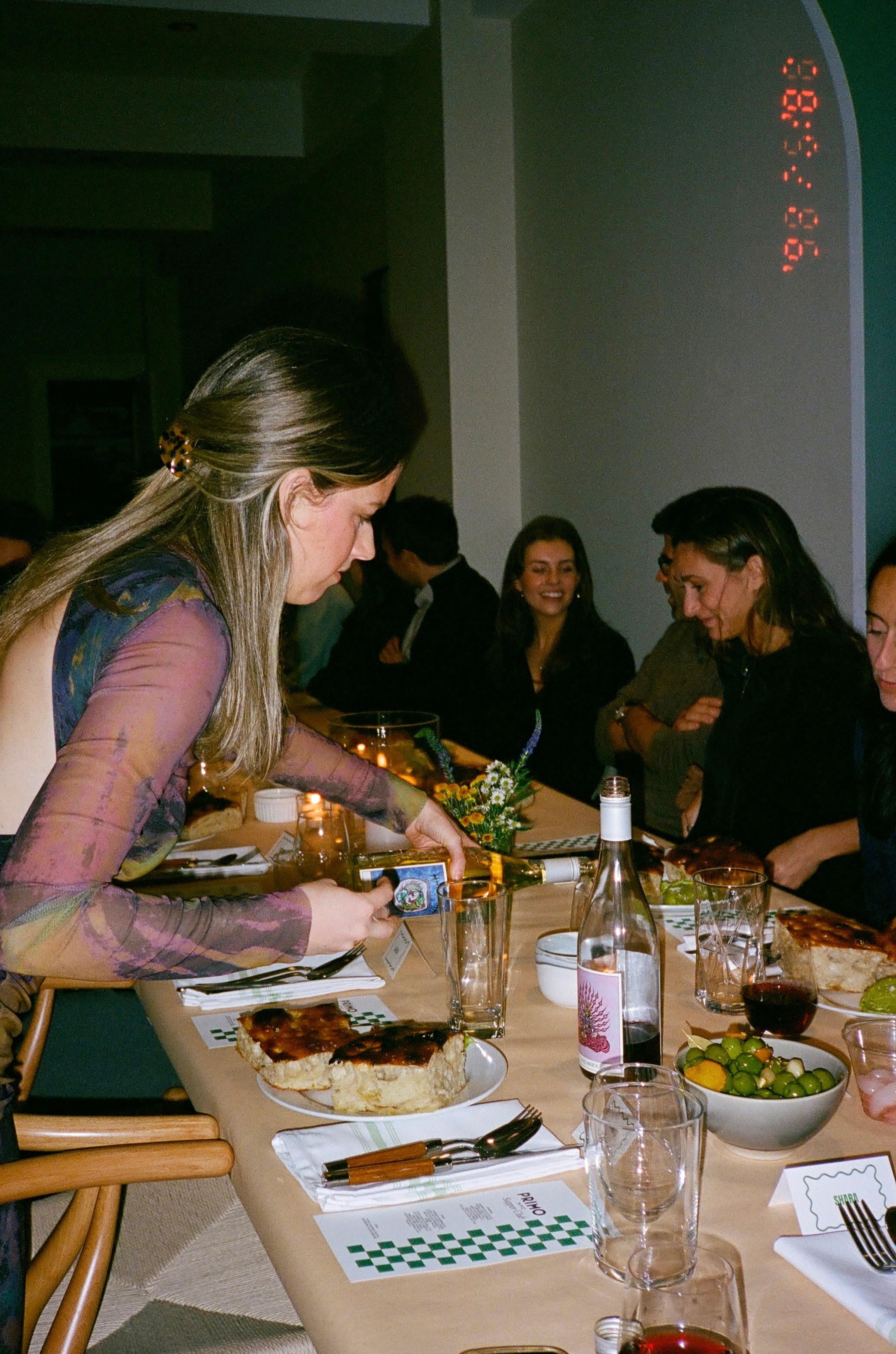 Guests enjoying private dinner with wine and dessert service